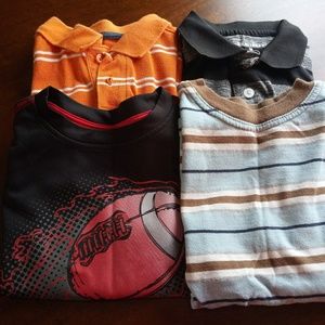 Set of 4 boys shirts.